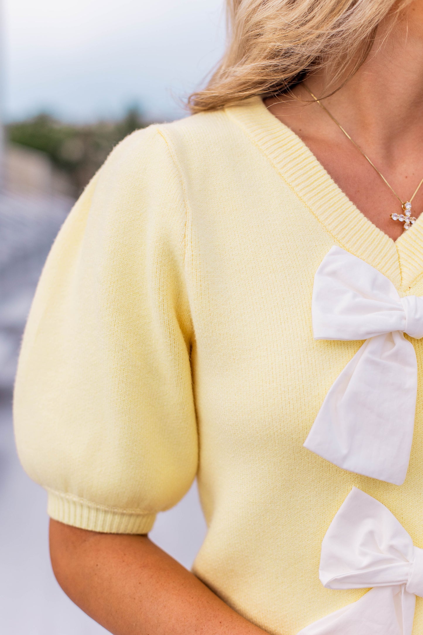 PUFF SLEEVE BOW FRONT SWEATER TOP