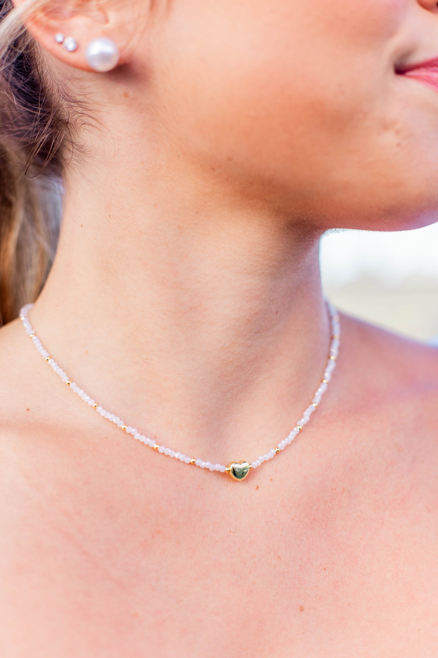 TINY GOLD HEARTBEAT NECKLACE