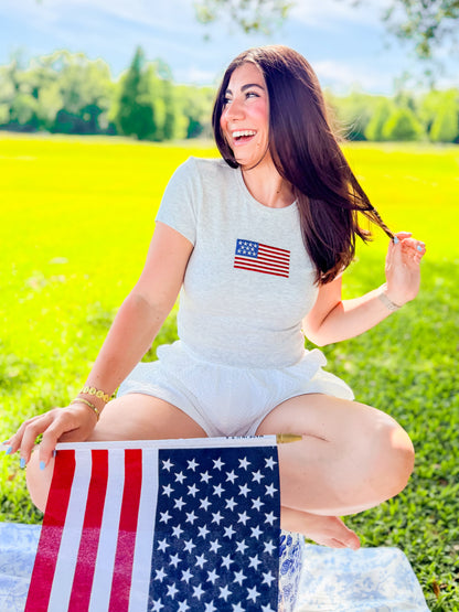 EMBROIDERED FLAG BABY TEE
