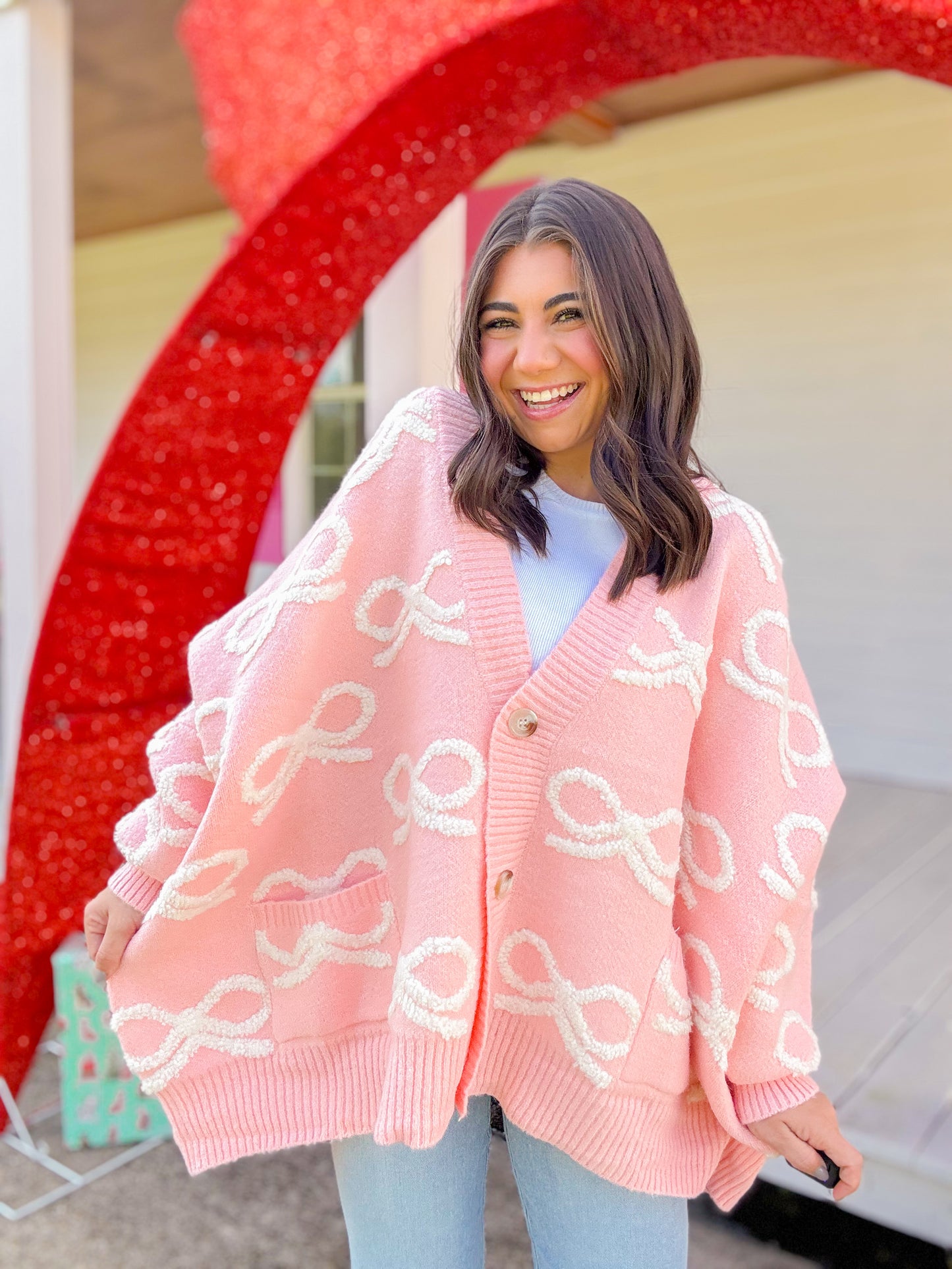 OVERSIZED BOW CARDIGAN
