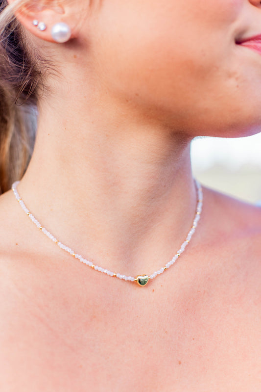TINY GOLD HEARTBEAT NECKLACE