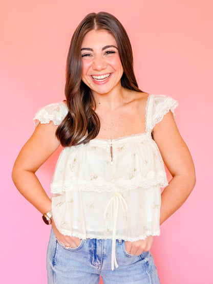 LACE TRIMMED TIERED RUFFLE TOP - CREAM