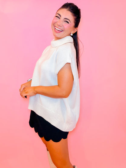 SLEEVELESS TURTLENECK OVERSIZED SWEATER