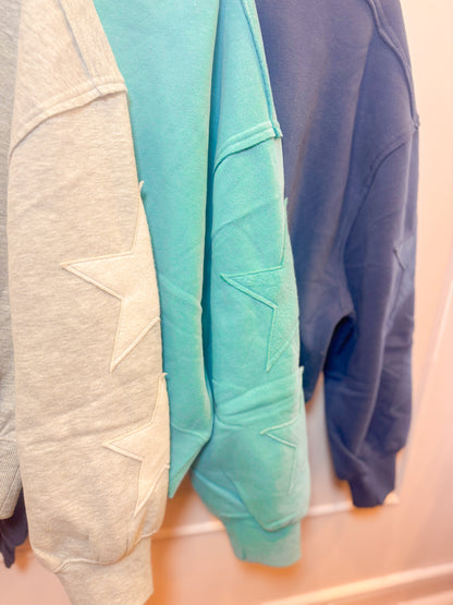 STITCHED STAR SLEEVE SWEATSHIRT