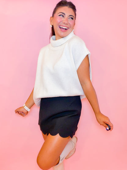 SLEEVELESS TURTLENECK OVERSIZED SWEATER