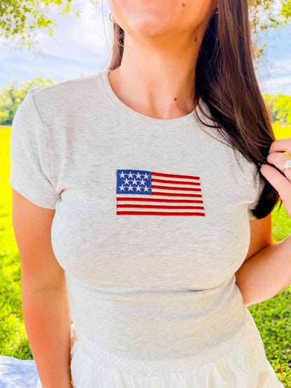 EMBROIDERED FLAG BABY TEE