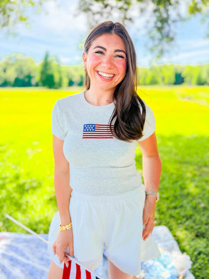 EMBROIDERED FLAG BABY TEE