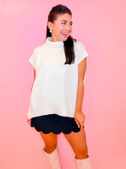 SLEEVELESS TURTLENECK OVERSIZED SWEATER